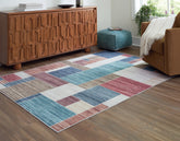 Bay Furniture Gallery - Ashley Furniture - Numore Rug - 8' x 9'11" Washable Rug / Multi - R406661